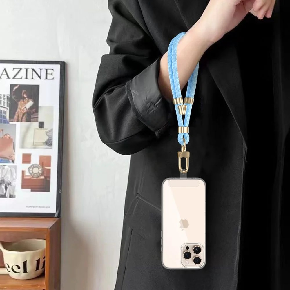 Popruh na zápěstí – jistota proti pádu telefonu při každodenním používání Popruh na zápěstí pro telefon – bezpečné držení mobilu a ochrana proti pádu